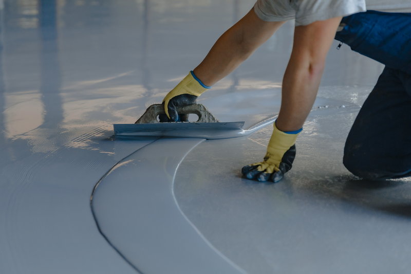 Self-leveling compound smooth concrete floor